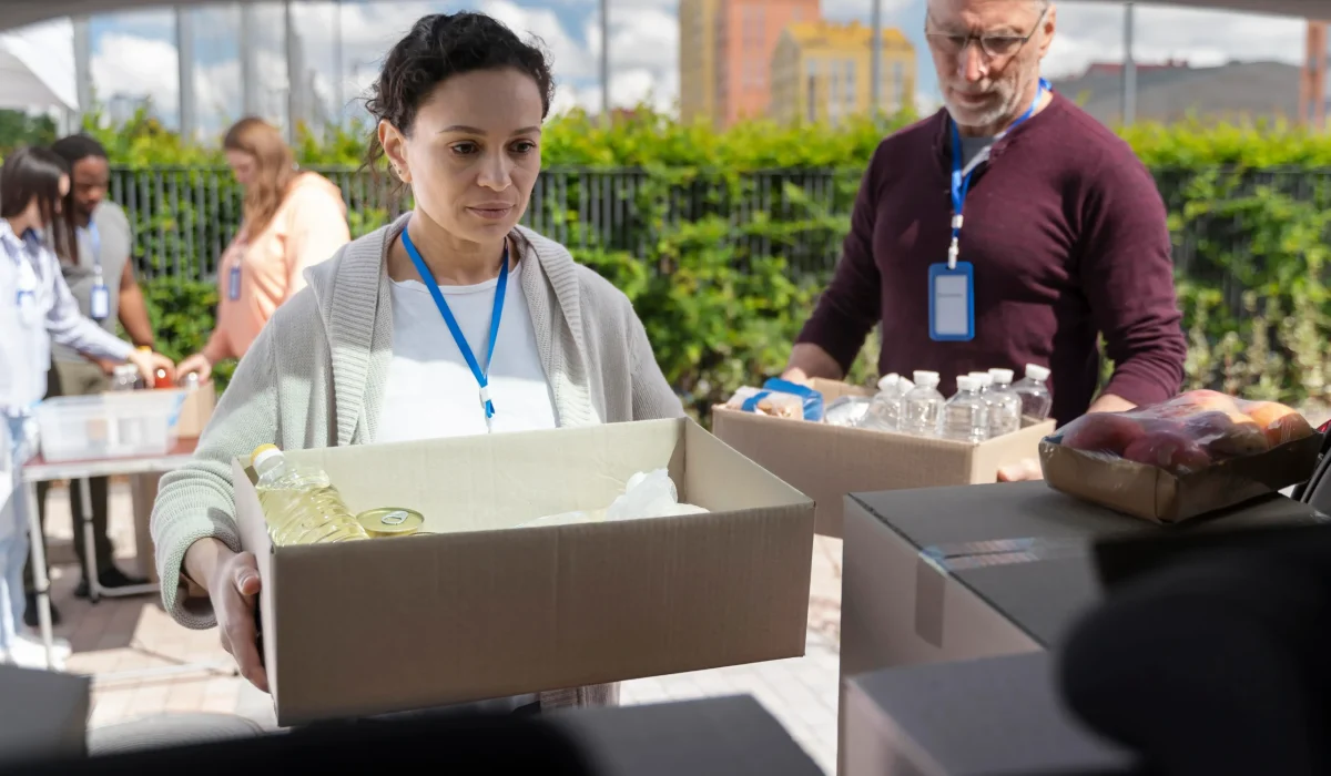 group-different-people-volunteering-foodbank-poor-people